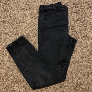 Women's size 28 high waisted black skinny jeans.